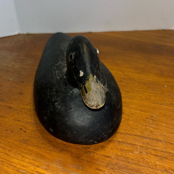 Vintage primitive wooden duck decoy with weight and bottom brass tone chain
